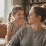 A video showcasing a Personalized family birthstone necklace with teardrop gemstones and initial charms in gold or sterling silver