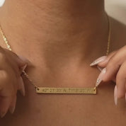 A video showcasing a skinny bar necklace worn on model showcasing dainty minimalist jewelry style. Custom hidden message necklace engraved with personalized morse code word, available in silver, gold, or rose gold filled. Elegant everyday necklace designed for meaningful gifting.