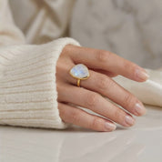 Video showcasing roung cut Moonstone, Labradorite, and Aqua Chalcedony ring