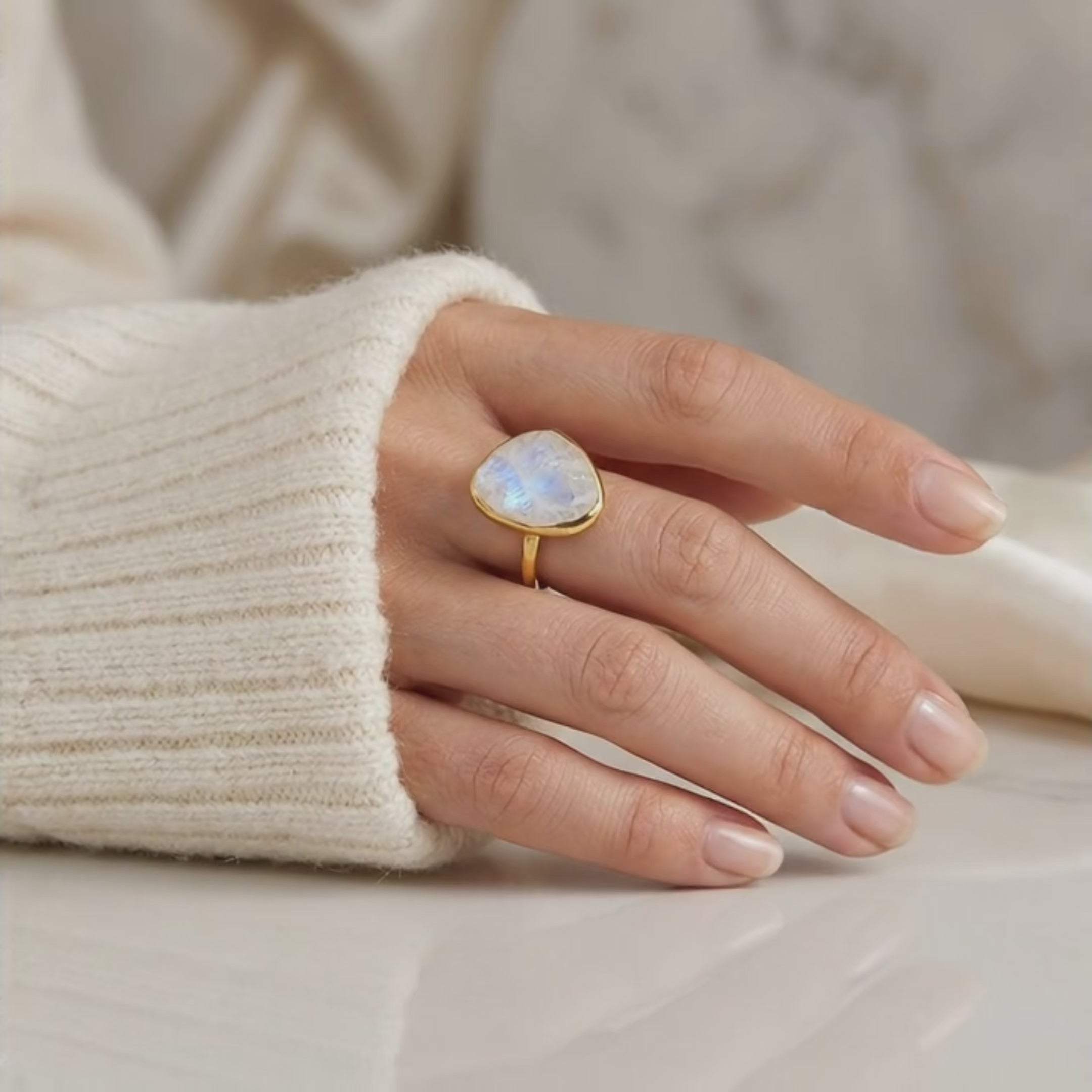 Video showcasing roung cut Moonstone, Labradorite, and Aqua Chalcedony ring