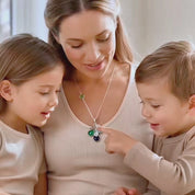 A video showcasing a Personalized birthstone necklace for mom with round connector stone, cascading teardrop birthstones, and engraved initial charms, a meaningful family necklace gift.