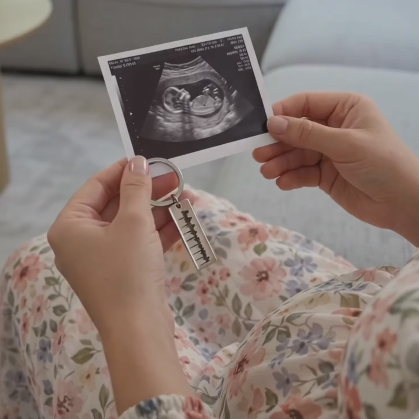 video showcasing a Personalized baby keychain, sonogram keychain, engraved baby keychain  custom engraved in gold, black or silver