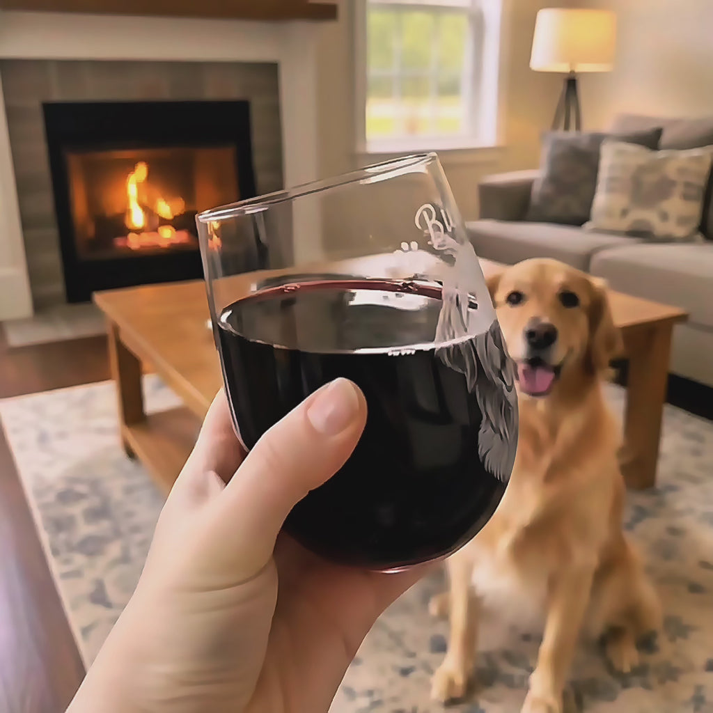 Video showing a hand holding a custom engraved stemless wine glass with a detailed dog portrait and the name “Buddy” in a cozy living room, fireplace glowing in the background and the real golden retriever sitting behind. Personalized pet portrait wine glass, custom dog lover gift, perfect for pet parents, birthdays, Christmas, or Mother’s Day, unique engraved wine glass keepsake.