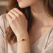 Custom birthstone and name bracelet in gold with rectangular baguette gemstones and engraved name bars, personalized family jewelry featuring multiple birthstones and custom names, delicate gold chain bracelet for mom or grandma gift, dainty stacking bracelet with blue and pink stones, meaningful mother’s jewelry keepsake, handmade personalized birthstone bracelet for women, elegant minimalist custom name jewelry gift for her