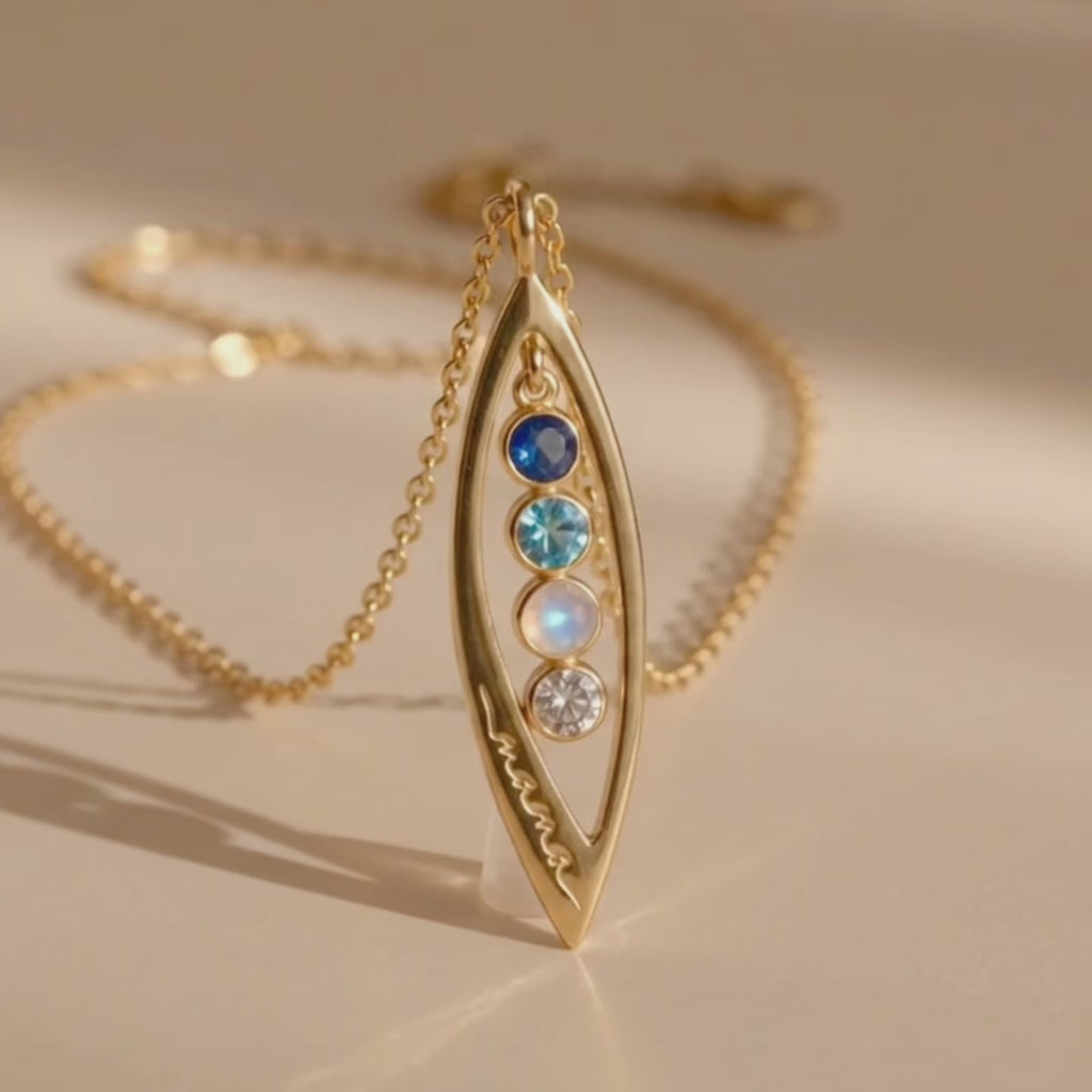 a video showcasing Custom marquise birthstone necklace with up to 5 tiny gemstones in gold, personalized family necklace for mom or loved one