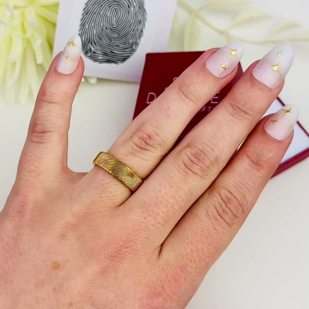 A video showing an engraved 6mm fingerprint ring, personalized gold, silver, rose gold memorial ring, memorial actual fingerprint ring, personalized 18k vermeil gold ring, subtle memorial ring for man, personalized men's memorial band, custom wedding band with spouse's fingerprint, Gift for her, gift for him, memorial gift, commemorative gift, gift for fiance, gift for husband, gift for wife, gift for girlfriend, gift for boyfriend, silver anniversary gift, wedding gift, graduation gift, gift giving ready