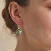Video showcasing birthstone earrings collection with multiple birthstone earring styles available in sterling silver, yellow or rose gold.