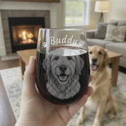 Video showing a hand holding a custom engraved stemless wine glass with a detailed dog portrait and the name “Buddy” in a cozy living room, fireplace glowing in the background and the real golden retriever sitting behind. Personalized pet portrait wine glass, custom dog lover gift, perfect for pet parents, birthdays, Christmas, or Mother’s Day, unique engraved wine glass keepsake.