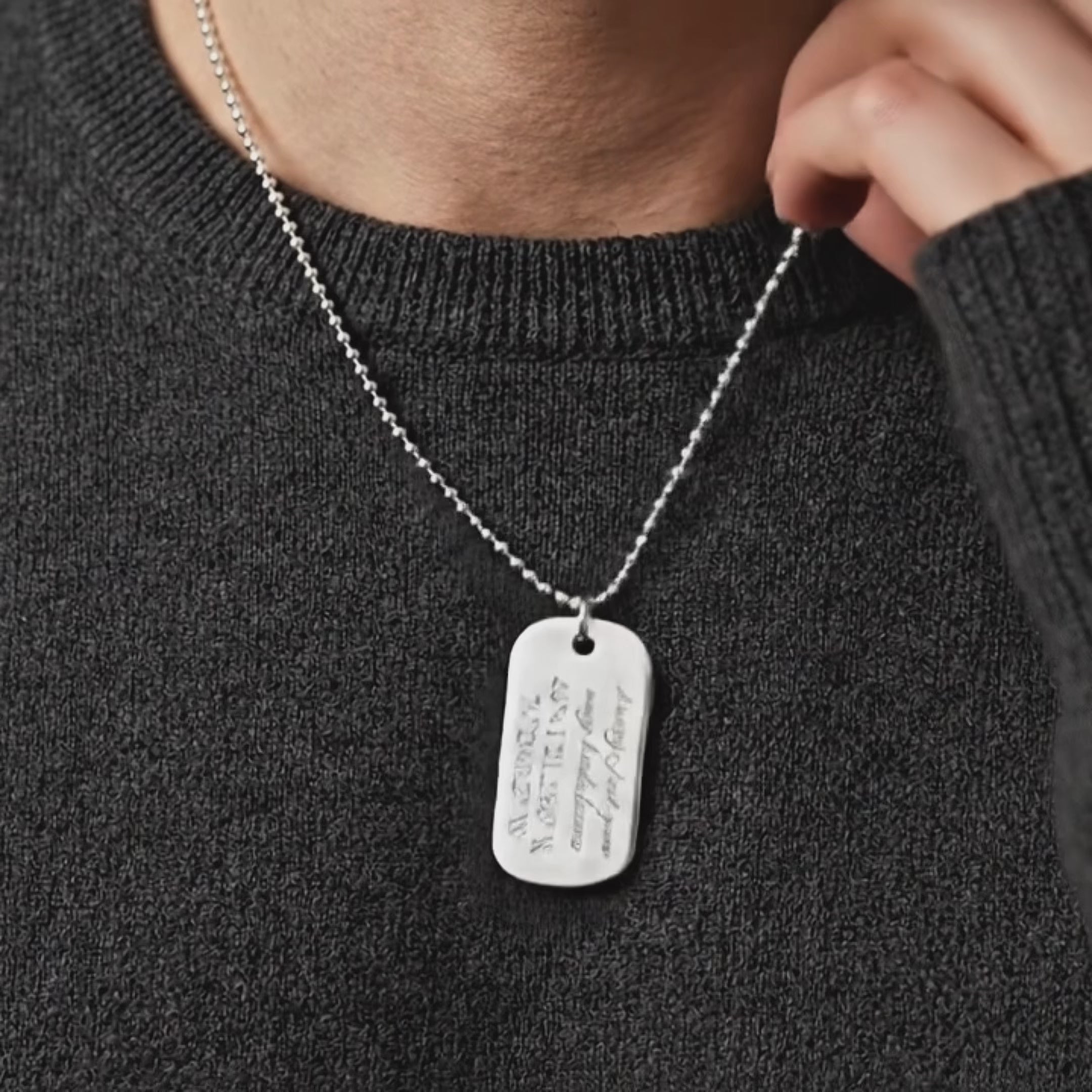 Video collection of engraved dog tag necklaces, unboxing presentation of dog tag necklace. Stainless Steel and Sterling Silver options are available. Stainless steel is larger, heavier, designed for daily wear and durability to last. Sterling silver is subtle and dainty, perfectly complimenting any outfit. Show love for each other with these gorgeous complimentary dog tag necklaces.