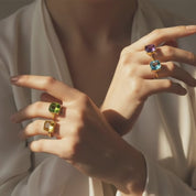 Natural Birthstone cushion bezel rings available in a variety on natural stones:  citrine, november birthstone ring and oval peridot August birthstone ring. Garnet, Purple Amethyst, Aquamarine, Clear Quartz, Emerald, Moonstone, Ruby, Sapphire, Fire Opal, Blue Topaz. Ready for gift giving in Danique Jewelry Branded Box. Available in Yellow or Rose gold or in Sterling Silver