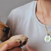 A video showing a variety of engraved paw print disc necklaces. Personalized paw print necklace, custom pet lover gift, pet loss gift, memorial for pet, in memory of dog, personalized cat loss video, personalized disc necklace sterling silver, rose gold, gold, dainty disc necklace, tasteful memorial gift for loss of pet