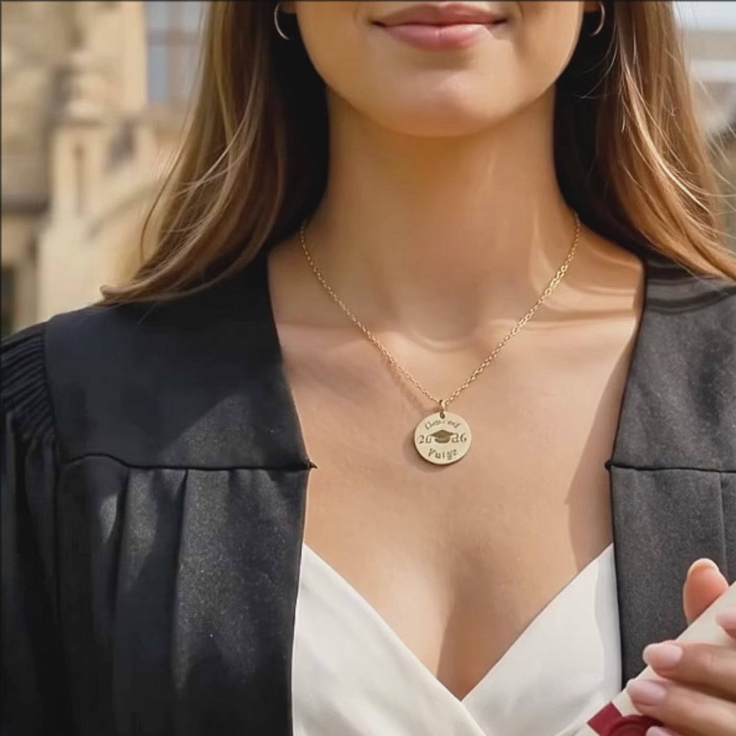 a video featuring Personalized graduation pendant necklace in gold or sterling silver, customized with an engraved name for a meaningful Class of 2026 graduation gift.