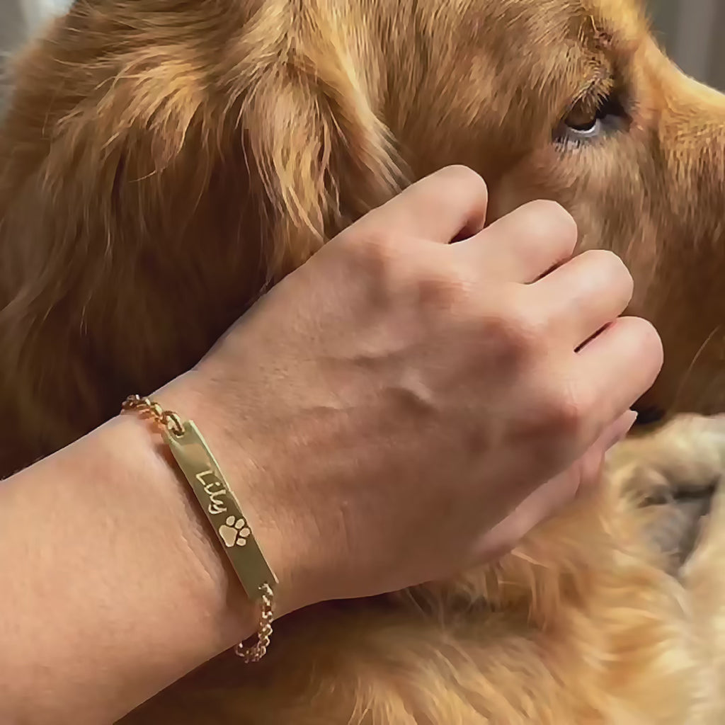 A video showing Danique Jewelry's custom personalized pet bracelet. Designed for layering and available in sterling silver, gold, or rose gold filled, this minimalistic bar bracelet is perfect for pet lovers of all ages.