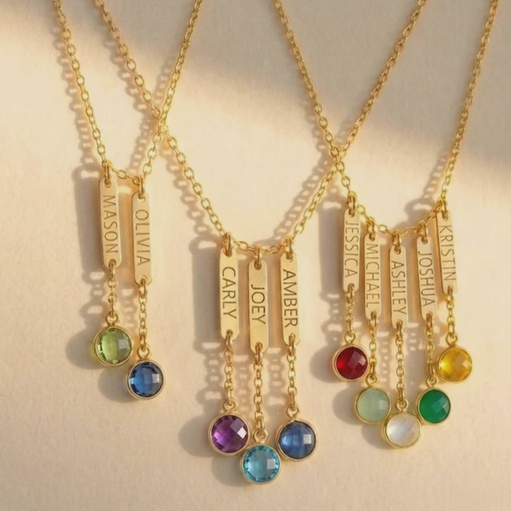 A video showcasing a Custom engraved name bar necklace with birthstone charms for mom or grandma representing her kids or grandkids