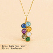 Custom birthstone necklace with up to twelve gemstones shown as a family necklace for mom or grandma