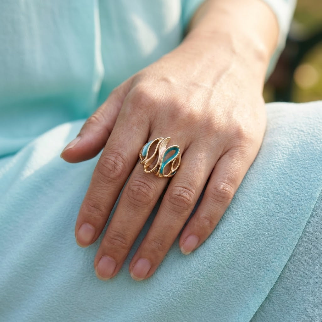 
Woman wearing Ocean Breeze Sculptural Wave ring
