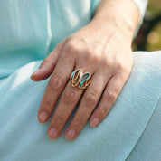
Woman wearing Ocean Breeze Sculptural Wave ring
