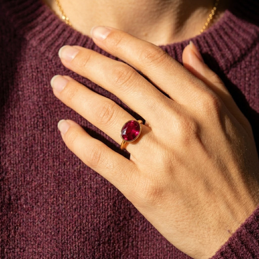 ruby gemstone ring worn on hand, elegant gold statement ring with oval red stone, dainty everyday jewelry