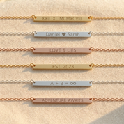 Personalized skinny bar necklaces engraved with names dates and coordinates

