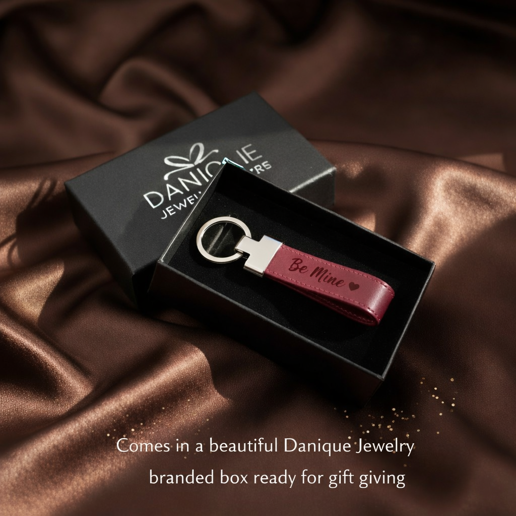Custom engraved leather keychain presented in a Danique Jewelry branded gift box, ready for gift giving
