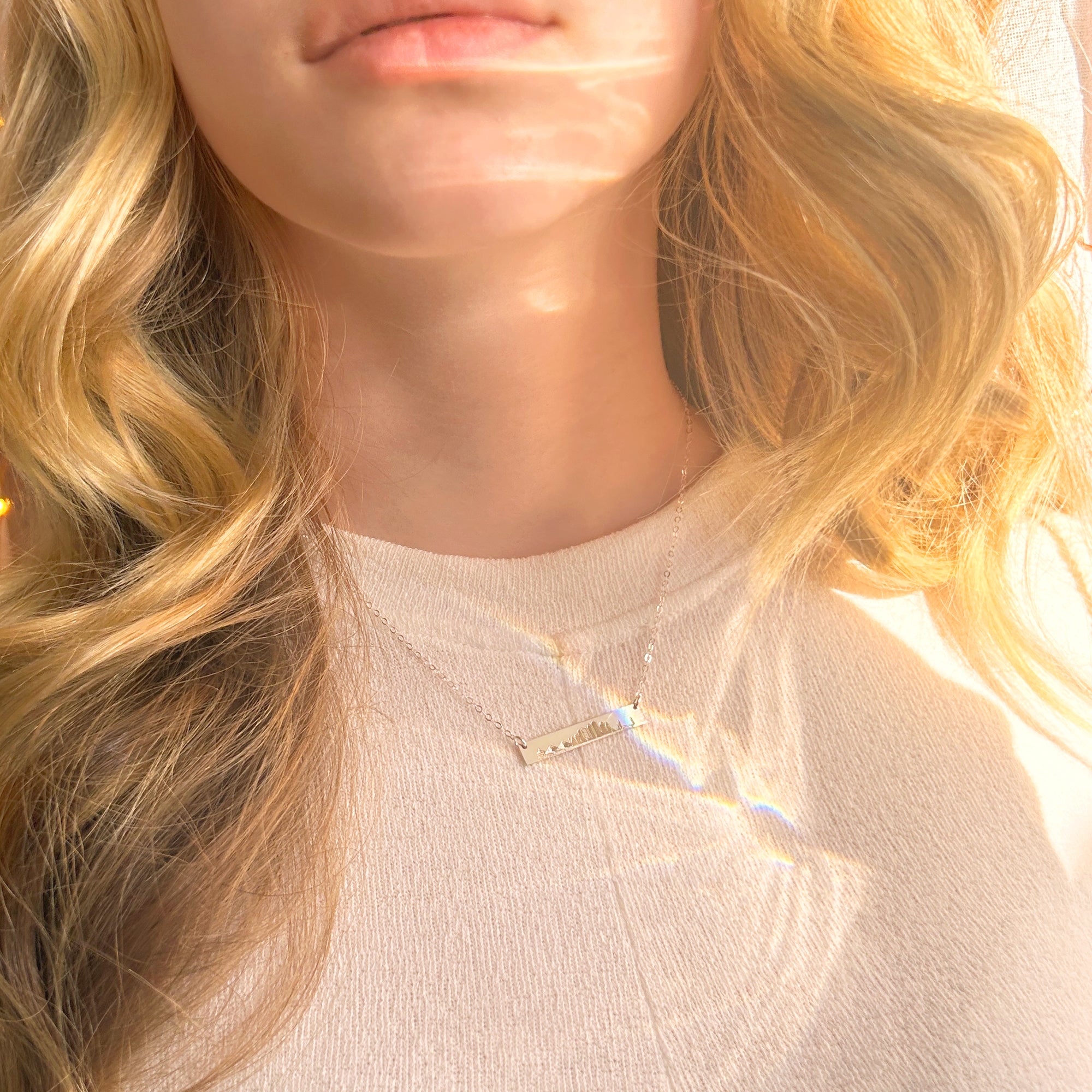 skyline-bar-necklace-on-model.jpg