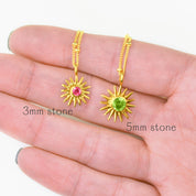 Side-by-side comparison of two sunburst birthstone necklaces with 3mm and 5mm gemstones, displayed in hand to show scale, sparkle and detailing of the radiant sun design. Personalized birthstone jewelry available in sterling silver, gold filled and rose gold filled, perfect for birthdays, Mother’s Day, Christmas, bridesmaids or best friend gifts. All birthstones offered for meaningful customization.