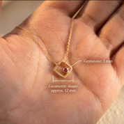 Close up of personalized square birthstone necklace with 3 mm gemstones