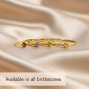 Customizable birthstone stacking rings with multiple children’s stones, ideal for creating a personalized mom ring set or family jewelry stack.