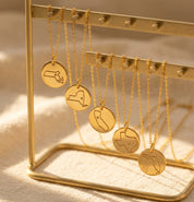 Custom state outline necklaces engraved with meaningful locations
