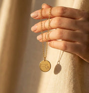Personalized state map necklaces with custom hometown heart markers
