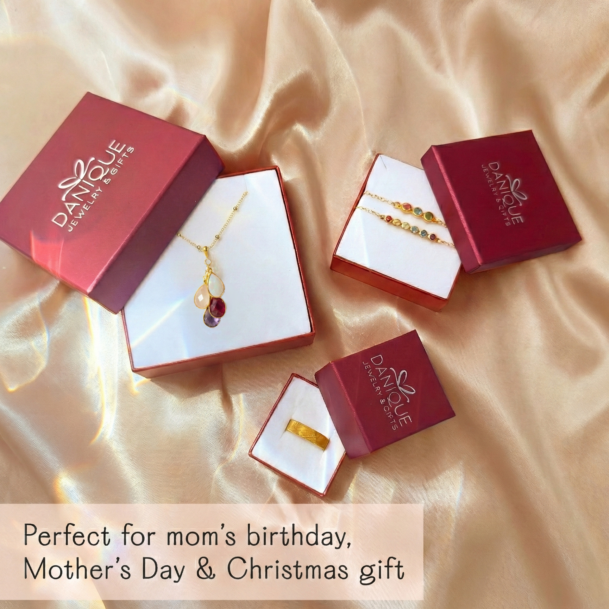Mother’s birthstone necklace personalized with multiple teardrop gems in sterling silver, gold vermeil, or rose gold, symbolizing children or loved ones in a luminous cascading design handcrafted in Massachusetts, USA