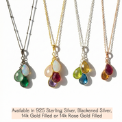Detail view of necklace chain and metal finishes for personalized birthstone necklace, showing sterling silver and 18K yellow or rose gold vermeil options, minimalist family jewelry designed for mom and grandma, custom birthstone pendant necklace with October opal, November citrine, and December blue topaz options, timeless everyday jewelry gift