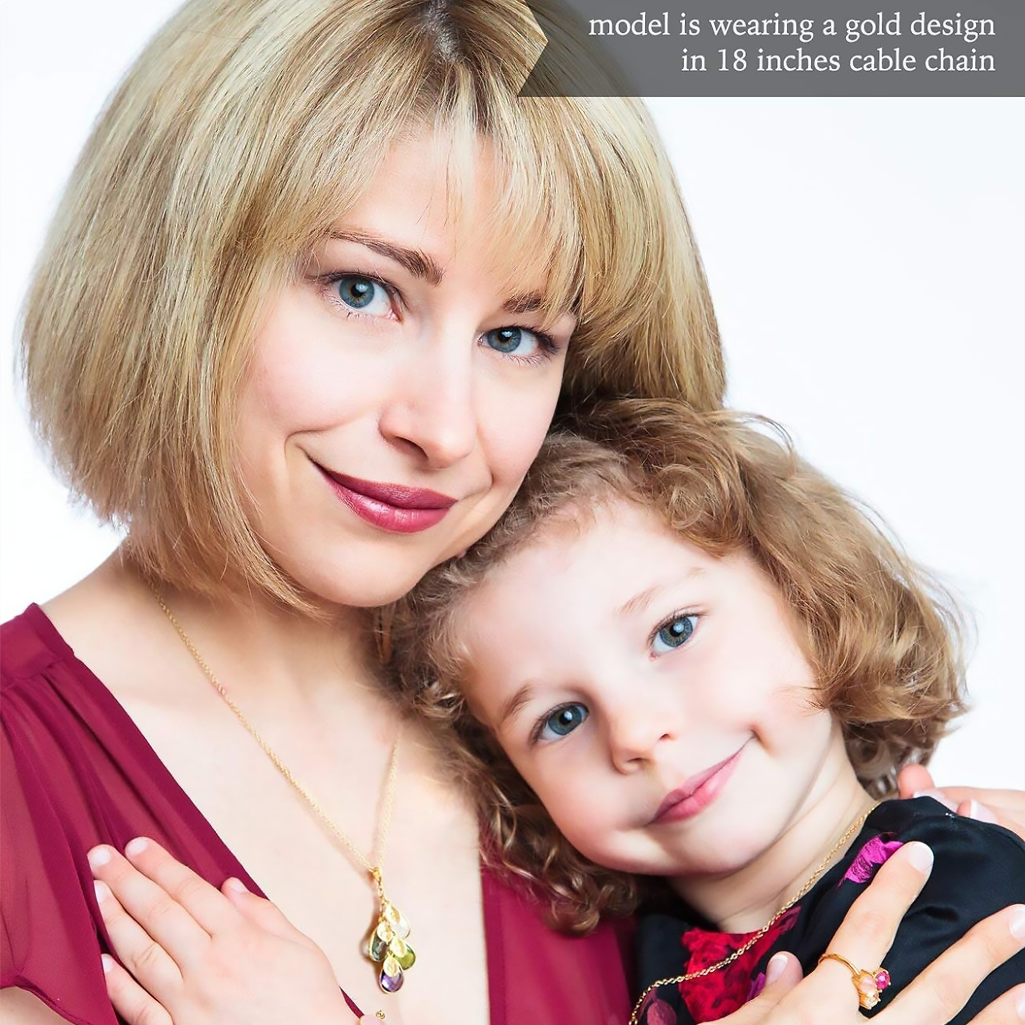 A mother wearing a leaf cascade necklace holds her young daughter. birthstone jewelry, personalized family tree, custom birthstone necklace, family tree pendant with names, custom engraved jewelry, sterling silver jewelry for mom, anniversary gifts for her, family birthstone jewelry, unique personalized gifts, family tree necklace for women, custom made jewelry, engraved custom necklaces, personalized family tree pendant, meaningful anniversary gift, family birthstone pendant, personalized necklace for mom