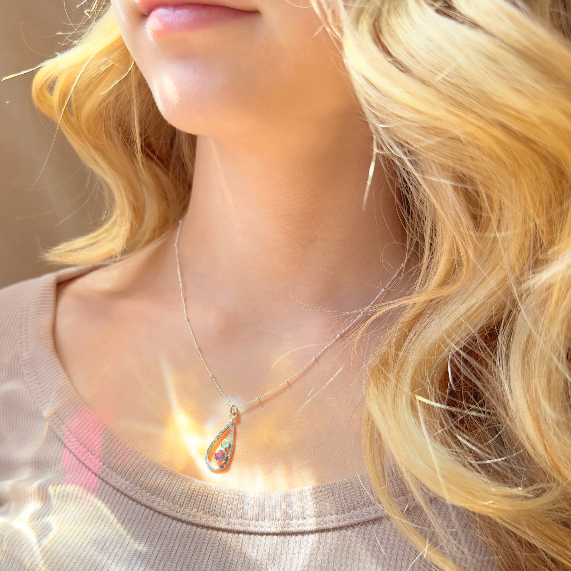 teardrom-birthstone-pendant-on-model.jpg