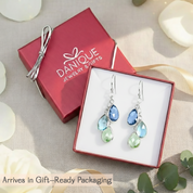 Teardrop birthstone earrings for mom featuring sparkling faceted gemstones in custom color combinations, designed as sentimental family jewelry that pairs beautifully with everyday or formal wear.