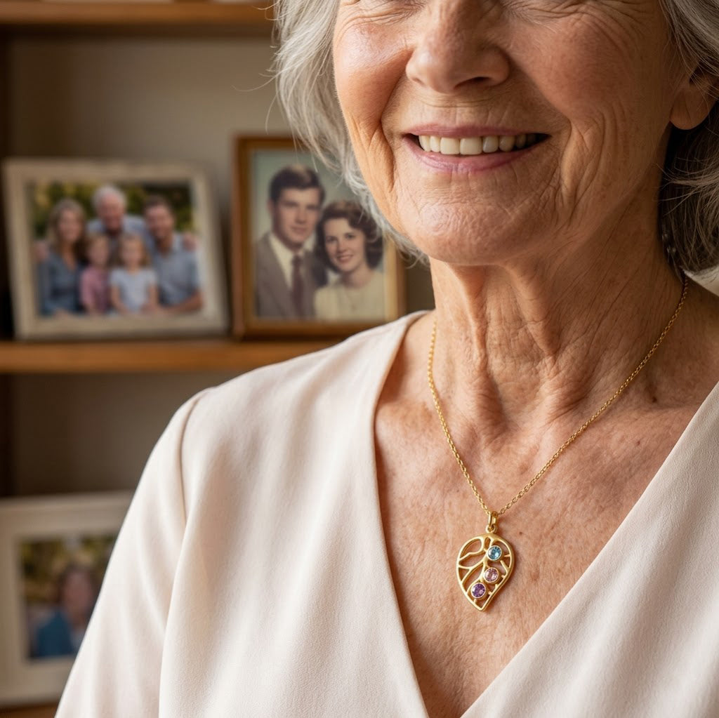 Grandma wearing a personalized leaf birthstone necklace, meaningful jewelry gift with stones representing family members.