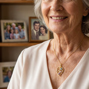 Grandma wearing a personalized leaf birthstone necklace, meaningful jewelry gift with stones representing family members.