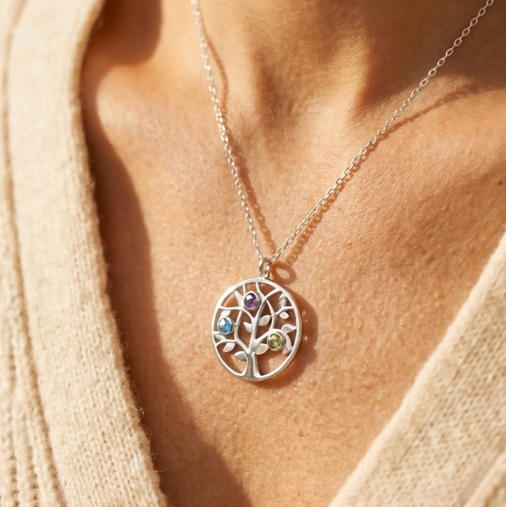 Personalized family tree birthstone necklace worn on model, custom mom necklace with birthstones, tree of life jewelry for mom, family birthstone pendant necklace, sentimental necklace gift for mother, meaningful keepsake jewelry for women, Mother’s Day gift idea, elegant personalized necklace for grandma or mom, custom birthstone jewelry in sterling silver, yellow gold, or rose gold, family necklace representing children and loved ones