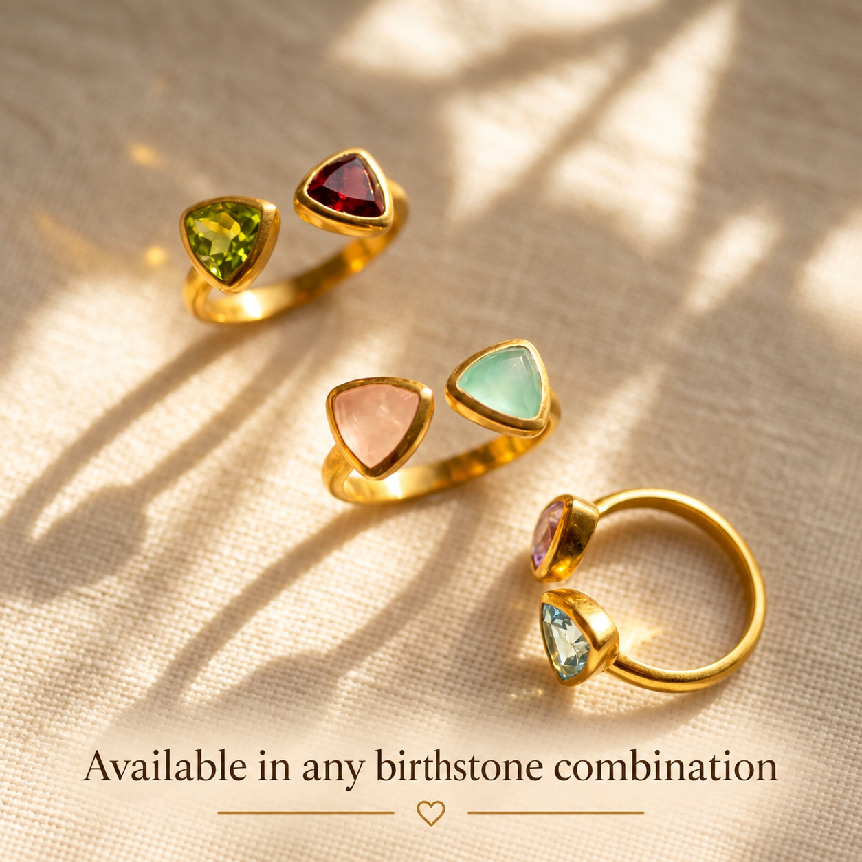Custom triangle rings showing mix and match birthstone combinations
