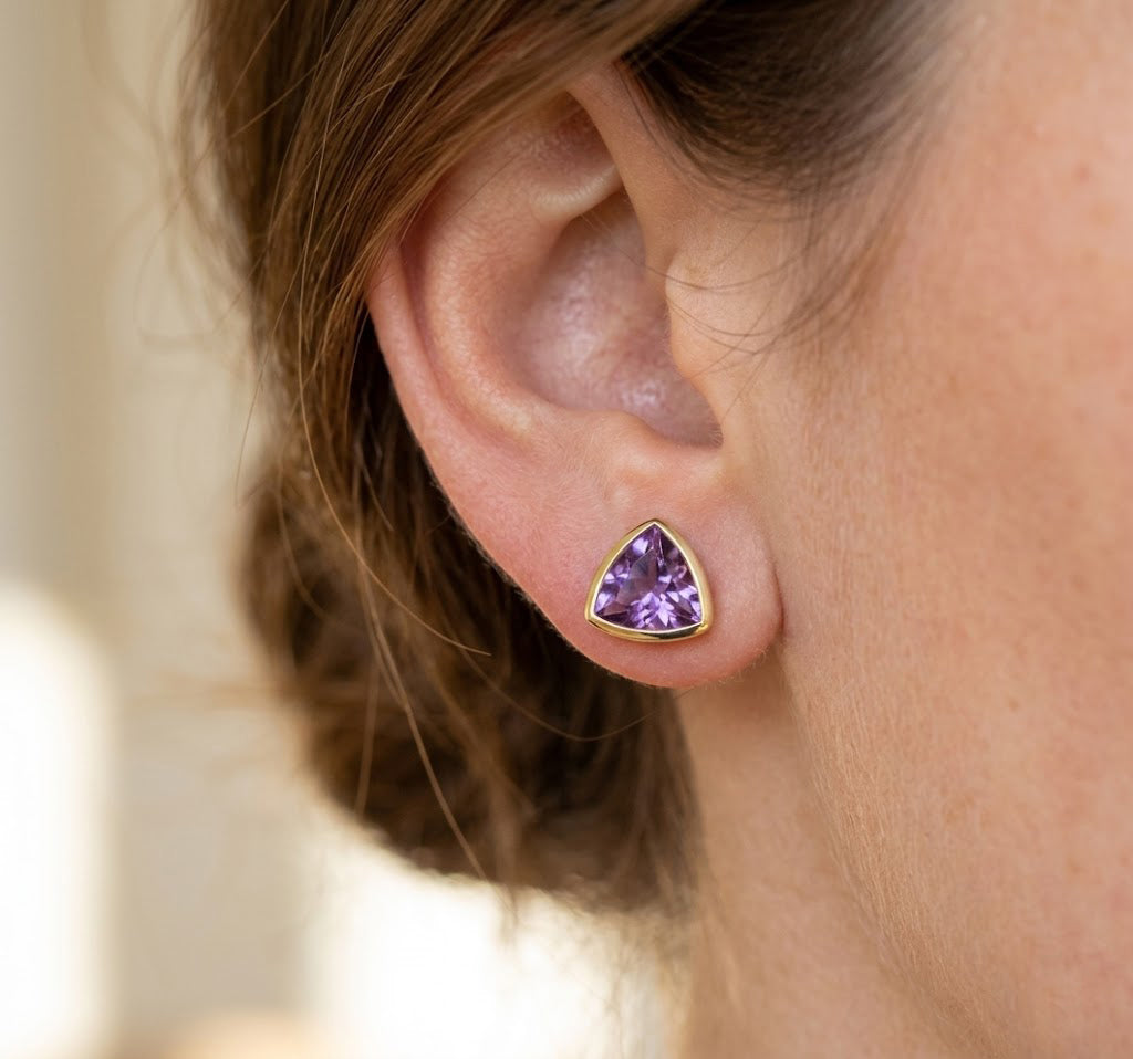 triangle-purple-amethsyt-stud-earrings-on-model.jpg