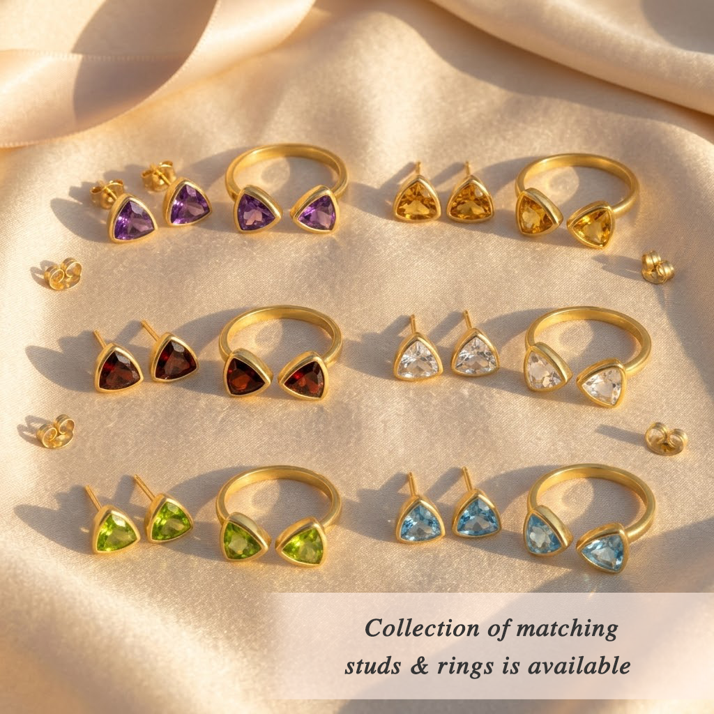Matching triangle gemstone stud earrings and rings shown in multiple stones and metal finishes.