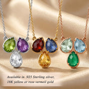 Custom teardrop birthstone necklace available in sterling silver, yellow gold, and rose gold finishes with colorful gemstone options.