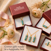 Personalized turquoise jewelry displayed in Danique Jewelry signature gift-ready packaging with necklace and earrings.