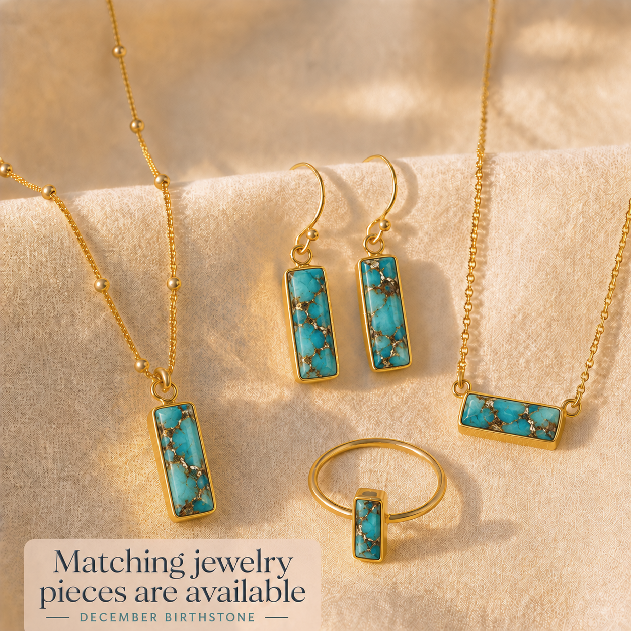 Matching turquoise gemstone jewelry set with personalized bar necklace, earrings and ring in gold.

