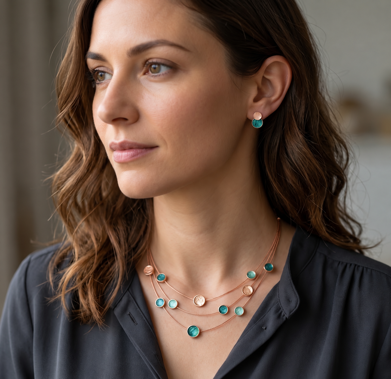 Woman wearing Turquoise and Silver double disc stud earrings with colorful necklace
