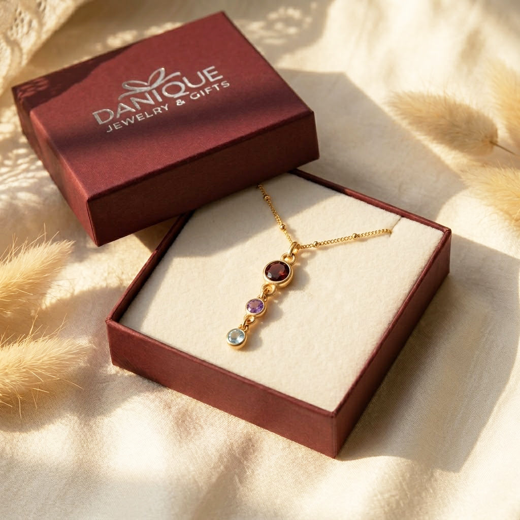 Custom birthstone necklace displayed in a Danique Jewelry gift box, ready for Mother’s Day, birthday, or new mom gifting.