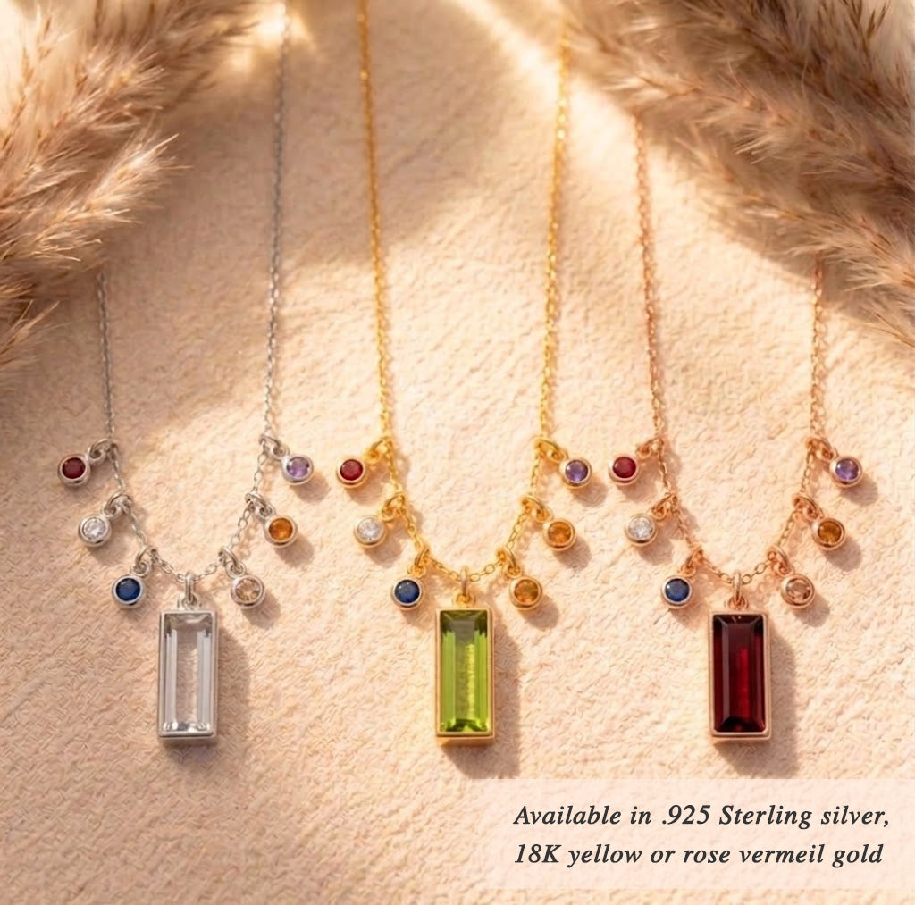 Personalized birthstone bar necklace available in sterling silver, gold, and rose gold finishes, with custom engraved charm and colorful gemstone connectors.