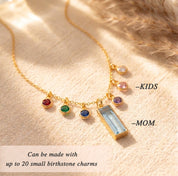 Gold custom mom necklace with engraved bar charm and children’s birthstones, shown with labels for mom and kids to highlight personalized family necklace design.