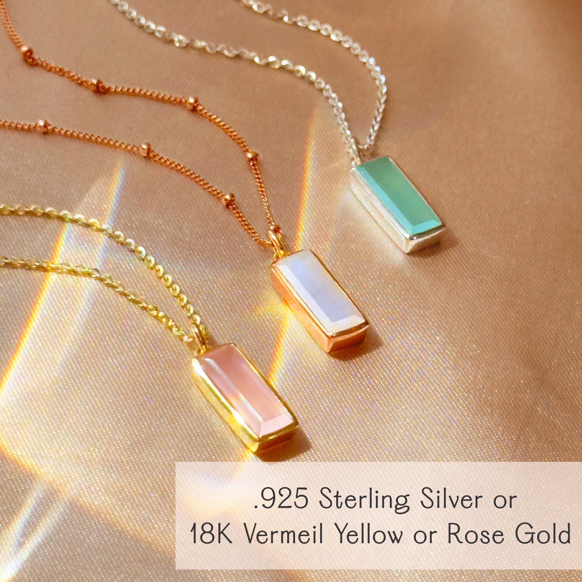 Baguette bar birthstone necklace with bezel-set gemstone and optional custom engraving. Shown in .925 sterling silver and 18K vermeil (yellow or rose gold). Minimalist, layer-friendly pendant—available for all birth months, gift-ready jewelry.