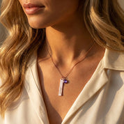 Custom engraved bar necklace with birthstone charm worn on model, dainty personalized necklace layered for everyday wear